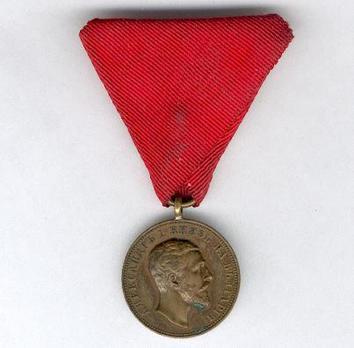 Medal for Merit, Type I, in Bronze (with older portrait and stamped "SCHWENZER") Obverse