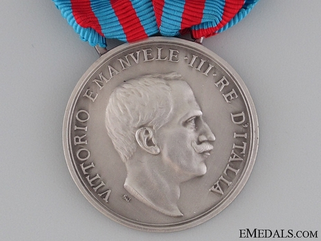 Silver Medal (stamped "S.J.", with silver) Obverse