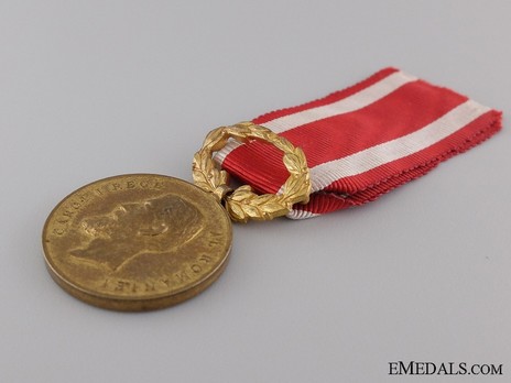 Medal of Merit for Education, I Class Obverse
