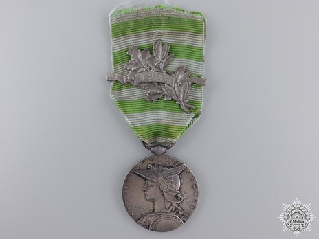 Silver Medal (with "1895" clasp, stamped "O.ROTY") Obverse