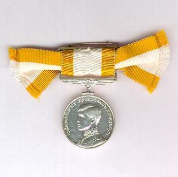 Investiture of H.R.H. Prince Vajiralongkorn as Crown Prince Silver Medal (for women) Obverse
