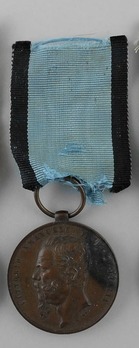 Bronze Medal (stamped "A.M.INC") Obverse