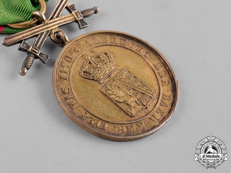 Order of Albert the Bear, Gold Medal of Merit with Swords (in bronze gilt) Obverse