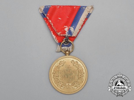 1902 Civil Merit Medal, in Gold (stamped HUGUENIN) Reverse