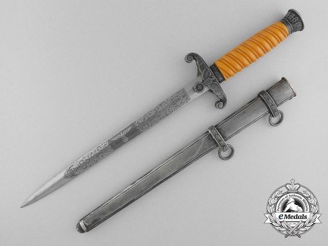 A dagger M 37 for leaders, manufacturer M 7/36, E. & F. Hörster, Solingen  Very good bright blade, the obverse with etched motto Blut und Ehre!  (Blood and Honour!), the reverse etched