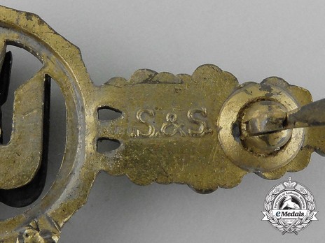 Bomber Clasp, in Gold (with "300" pendant) Detail