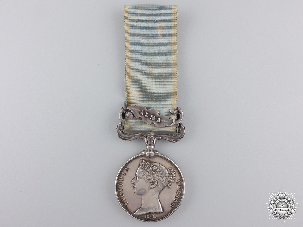 Silver medal with alma clasp stamped w. wyon r.a. b. wyon sc. obverse