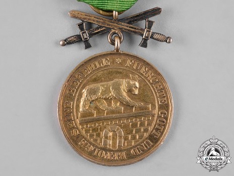 Order of Albert the Bear, Gold Medal of Merit with Swords (in bronze gilt) Obverse