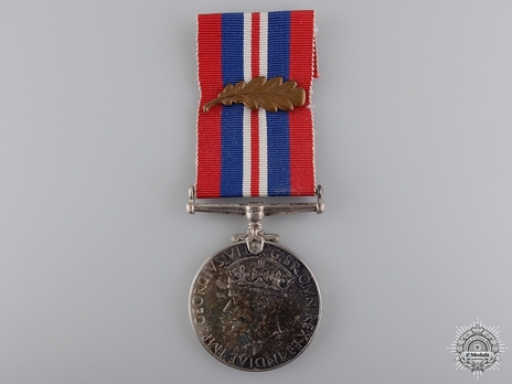 Silver Medal (with silver, with bronze clasp) Obverse