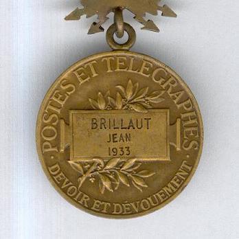 Bronze Medal (stamped “P.TASSET,” 1926-1959) Reverse