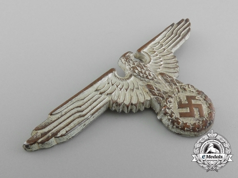 Waffen-SS Metal Cap Eagle Type II, by Assmann (cupal) Obverse