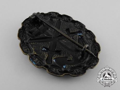 Naval Wound Badge, in Black (in brass) Reverse
