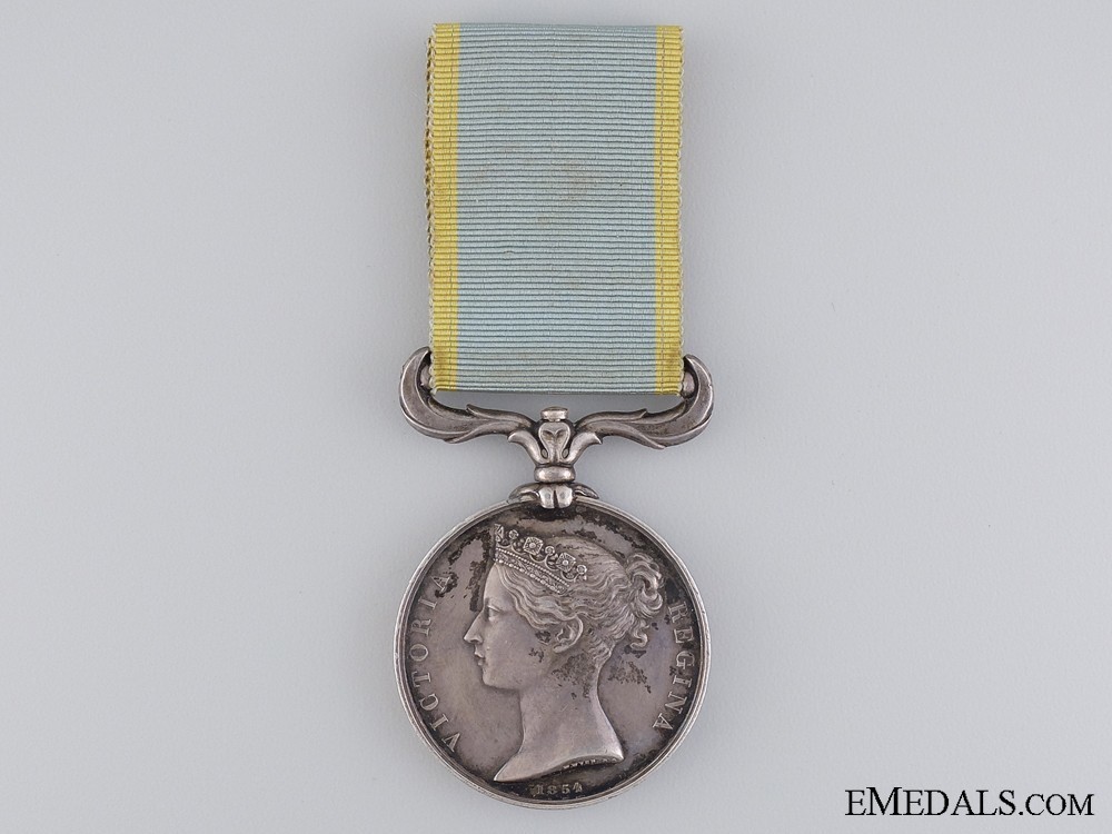 Silver medal stamped w. wyon r.a. b. wyon sc. obverse