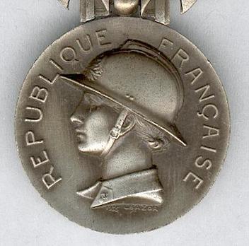 Silver Medal (for Bravery, stamped "1935 L BAZOR," 1935-1981) Obverse