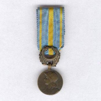 Miniature Bronze Medal (stamped "GL," "E M LINDAUER") Reverse