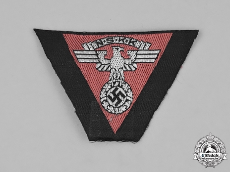 NSKK Cloth Cap Eagle on Triangle Backing (Austria version) Obverse