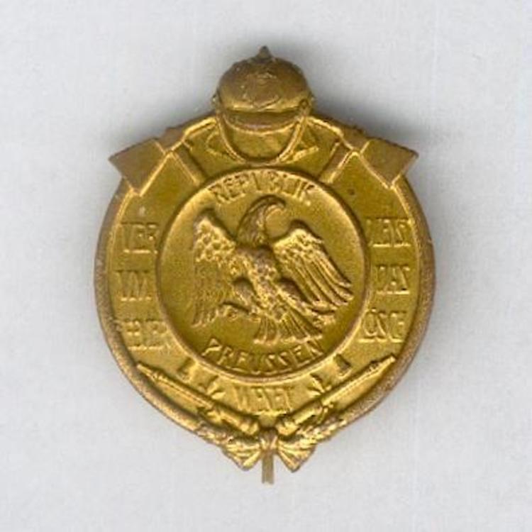 Gilded bronze badge obv