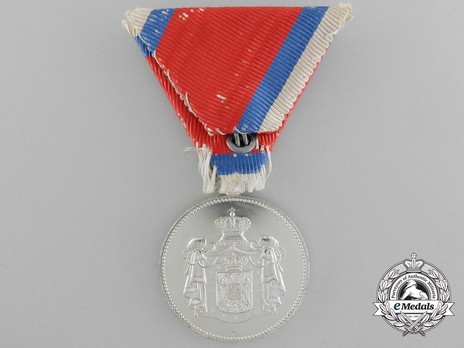 1902 Civil Merit Medal, in Silver (stamped HUGUENIN) Obverse