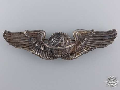 Wings (with sterling silver) (by N.S. Meyer, stamped "N.S. MEYER, INC. NEW YORK") Obverse