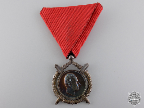 Order of Merit, Type II, II Class, in Silver (with young portrait stamped "A.SCHARFF") Obverse